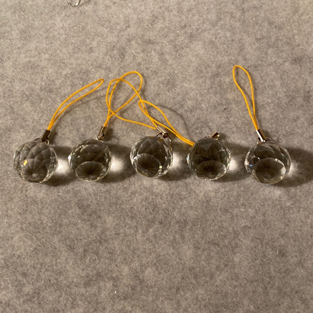 5 crystal cut balls. Approximately 1 inch long